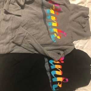 Both pink turtle neck hoodies